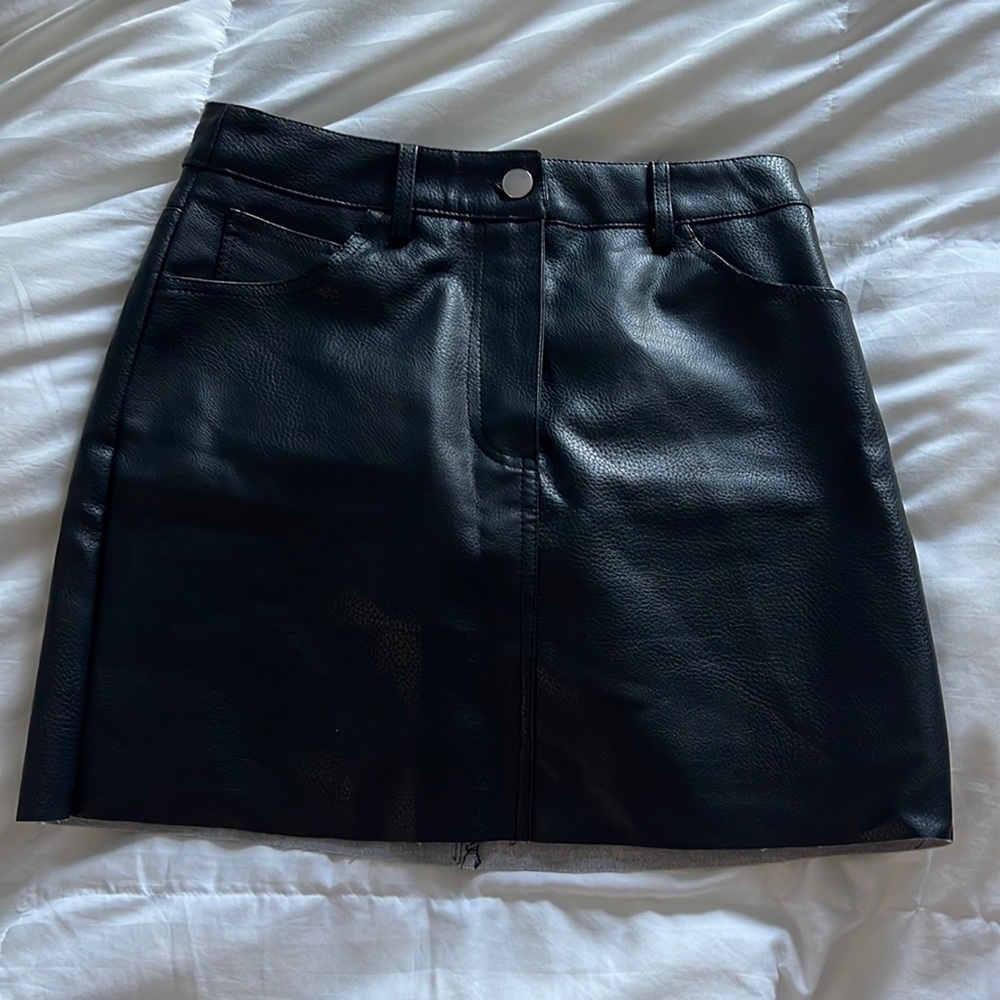 Black faux leather mini skirt